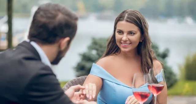 A couple enjoying a conversation outdoors
